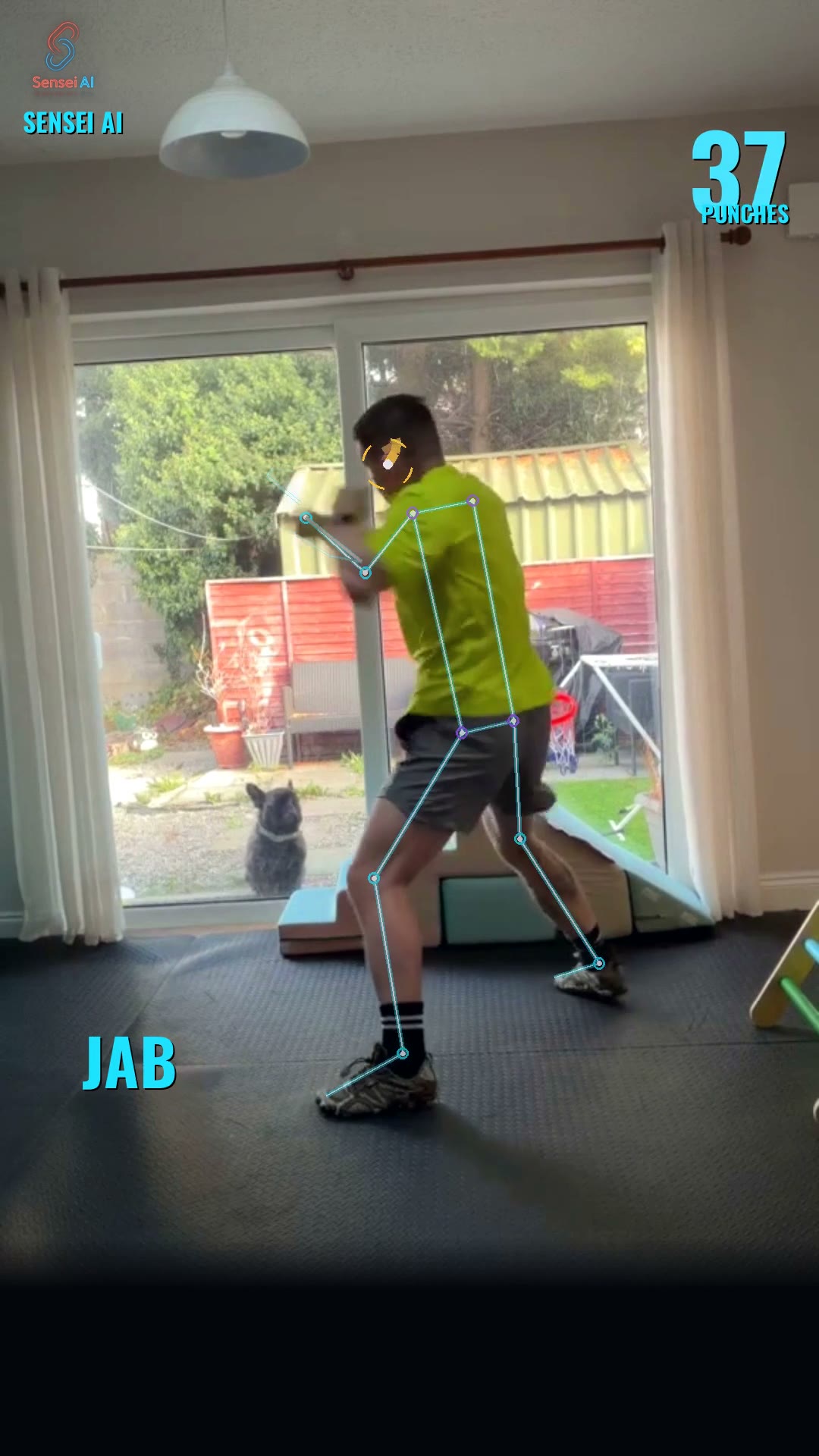 A still from the Sensei AI computer-vision demo showing a person practising a punch with a body-tracking overlay
